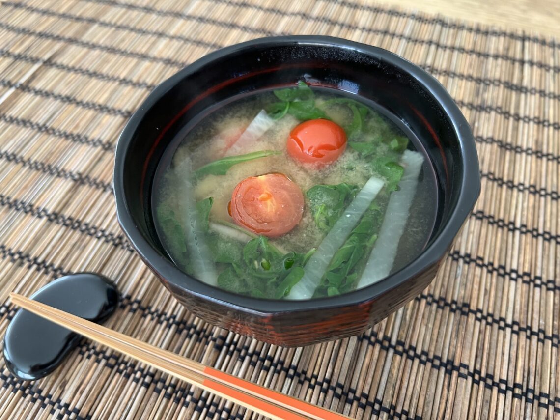 miso soup with daikon, cherry tomato, and arugula