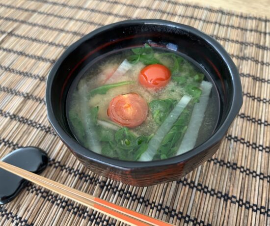 miso soup with daikon, cherry tomato, and arugula